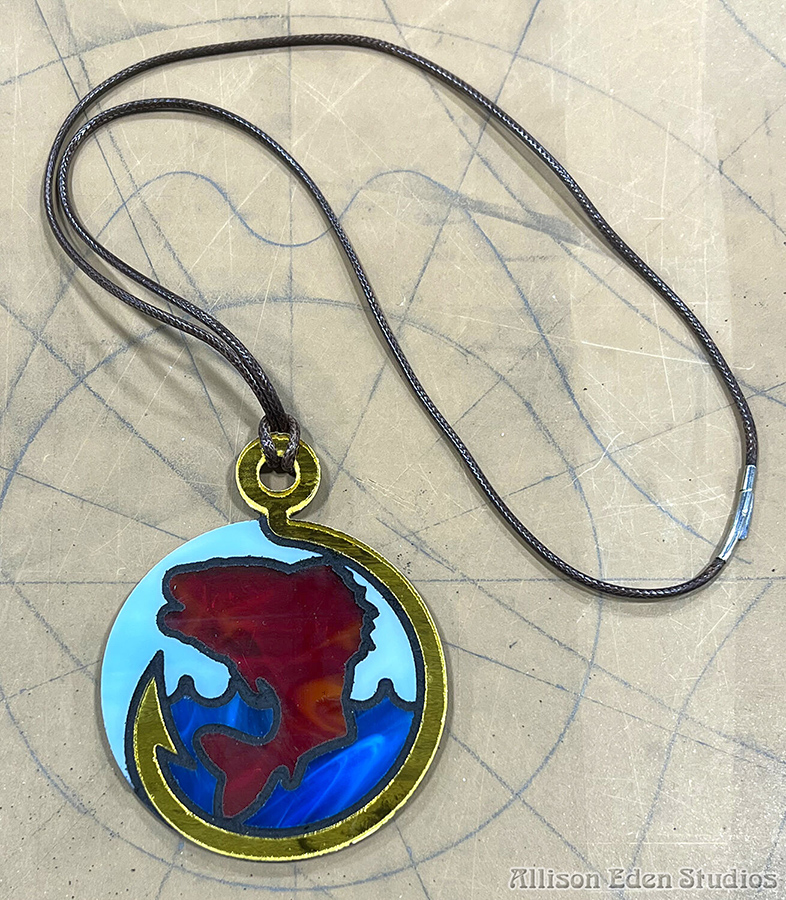 Largemouth bass stained glass fishing necklace framed by a gold mirror hook