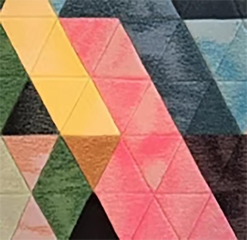 Watercolor Triangles carpet detail in coral, yellow, green and blue