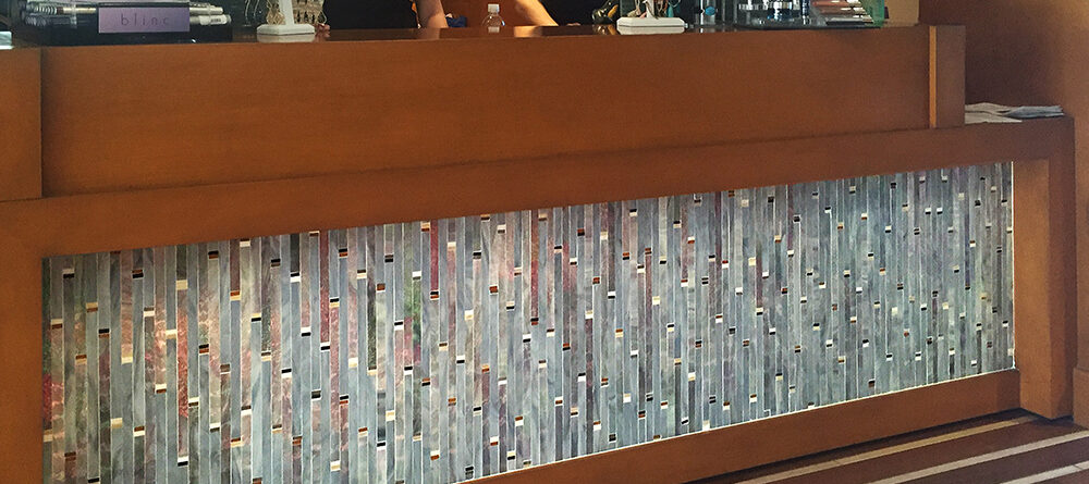 custom spa reception desk mosaic