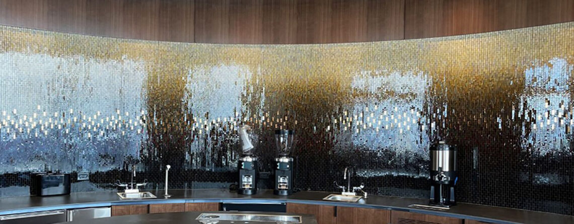 Custom ombré glass and copper mirror mosaic coffee bar at One Vanderbilt by Allison Eden Studios