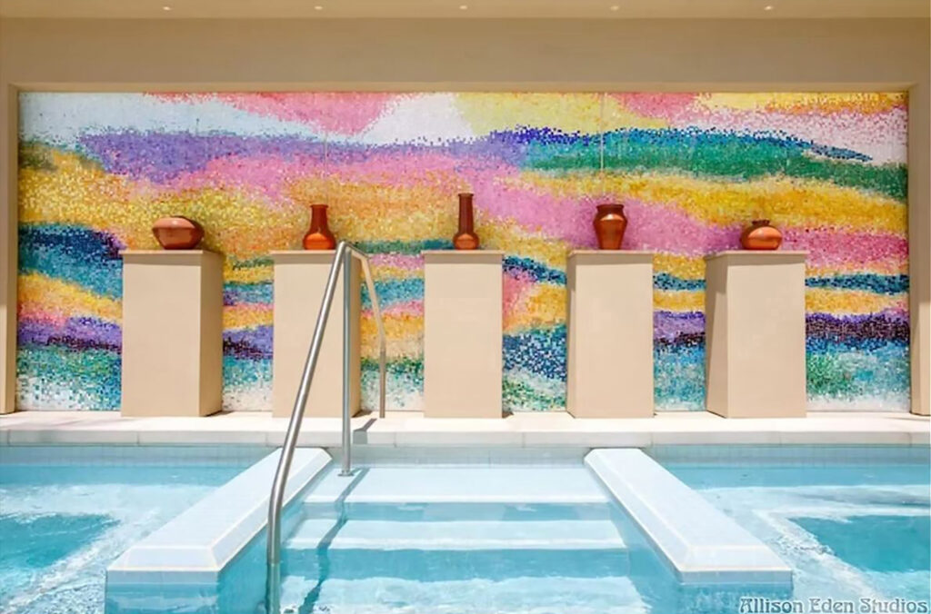 Large custom stained glass mosaic wall inspired by an Arizona sunset at Talking Stick Resort spa, handcrafted by Allison Eden Studios.