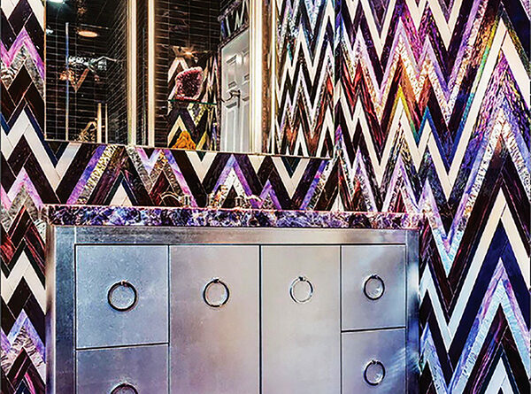 Luxury powder room featuring Allison Eden Studios Extreme ZigZag custom glass and mirror mosaic tile in violet, purple, black and white