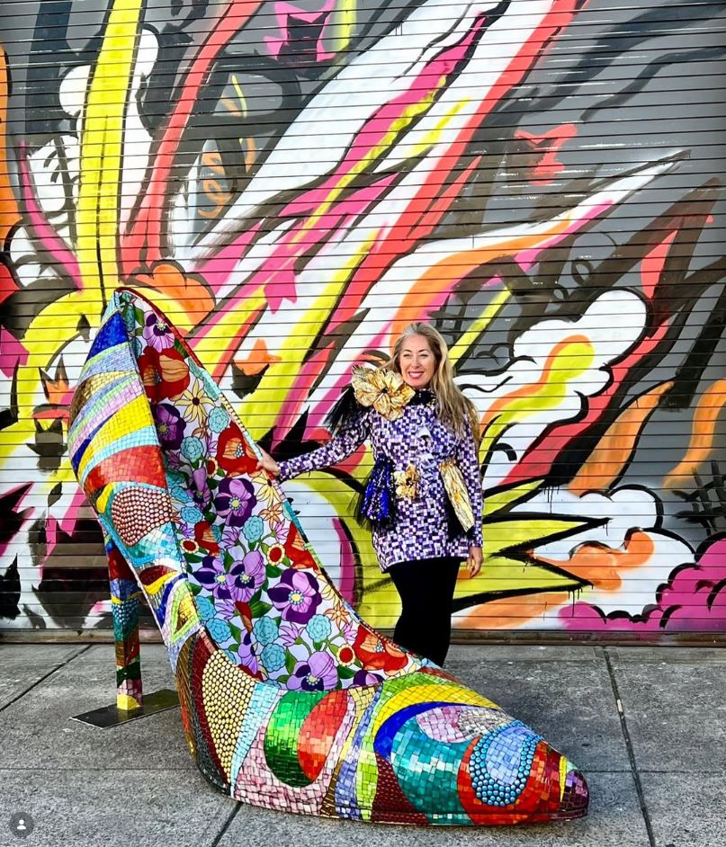 Mosaic High Heeled Shoe Sculpture with Allison Eden in front of her mosaic glass art studio.
