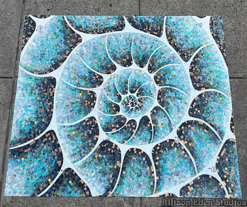 Large handcrafted nautilus glass mosaic during the fabrication process at Allison Eden Studios.”