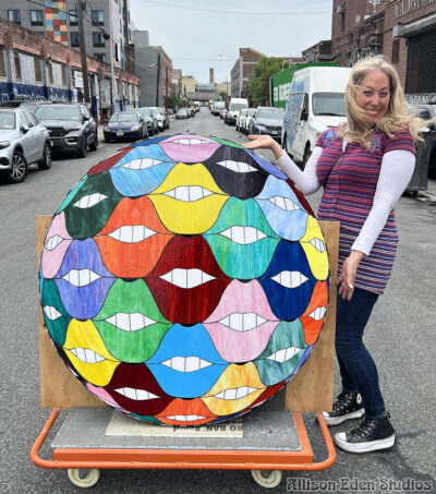 Allison Eden Studios SMILE Lips Round glass mosaic Artwork on Cook St wm