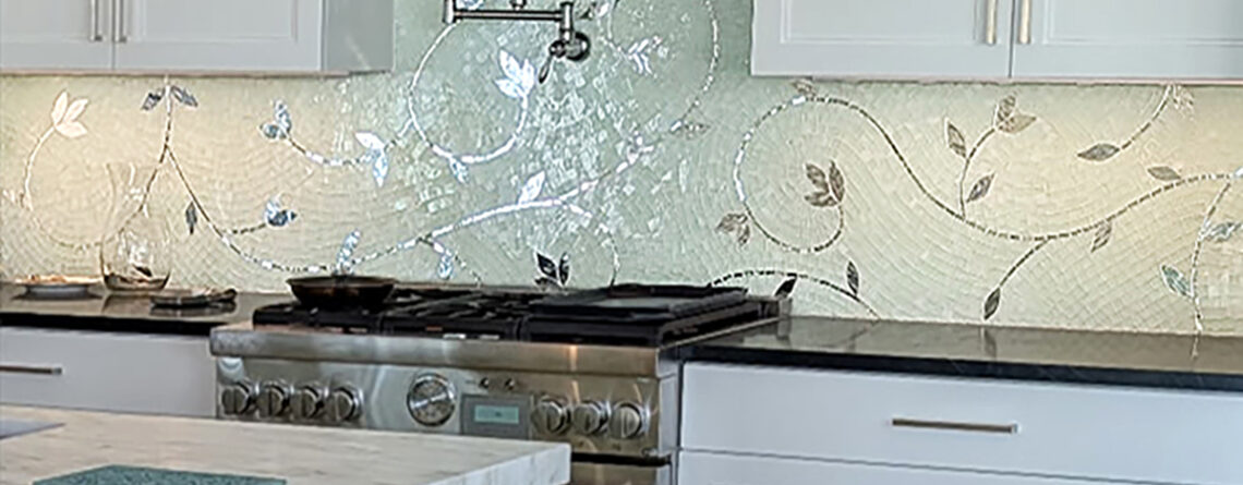a stained glass mosaic tile vines and leaves pattern kitchen backsplash hand crafted by Allison Eden Studios