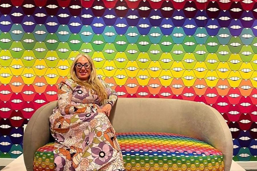 Allison Eden Studios colorful rainbow wallpaper and couch