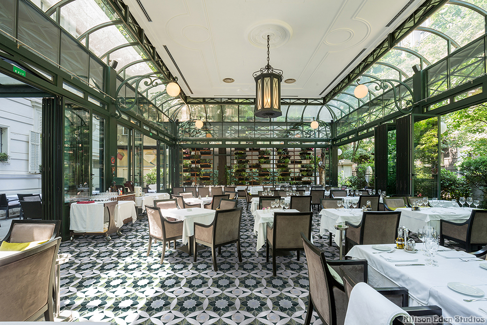 Moroccan Love green stone mosaic flooring by Allison Eden Studios in an elegant restaurant interior.