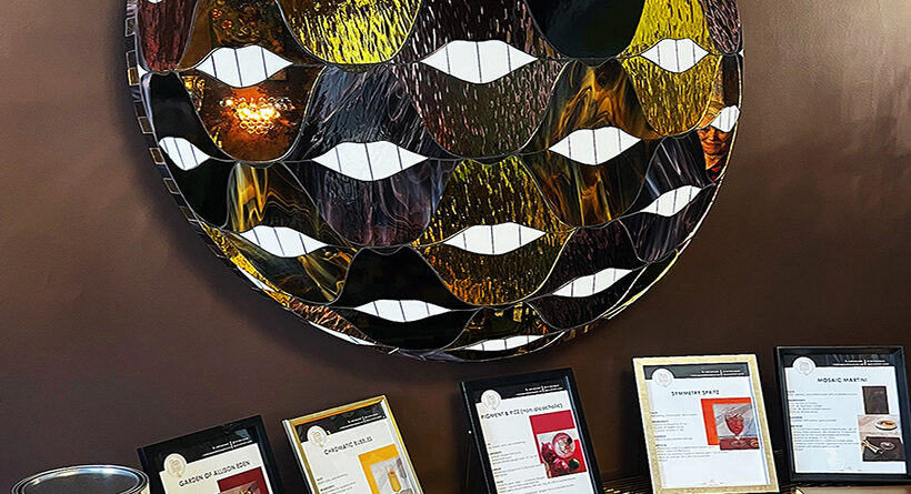 SMILE Fun Ball stained glass and mirror mosaic artwork by Allison Eden Studios featuring gold, chocolate, lavender, and amber glass inspired by Sherwin-Williams color palettes.