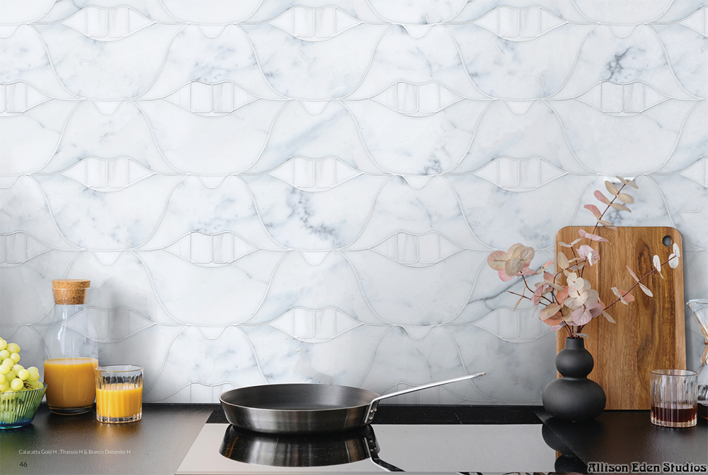 White marble kitchen backsplash featuring Allison Eden Studios SMILE Lips stone mosaic in Calacatta Gold, Thassos and Bianco Dolomite.