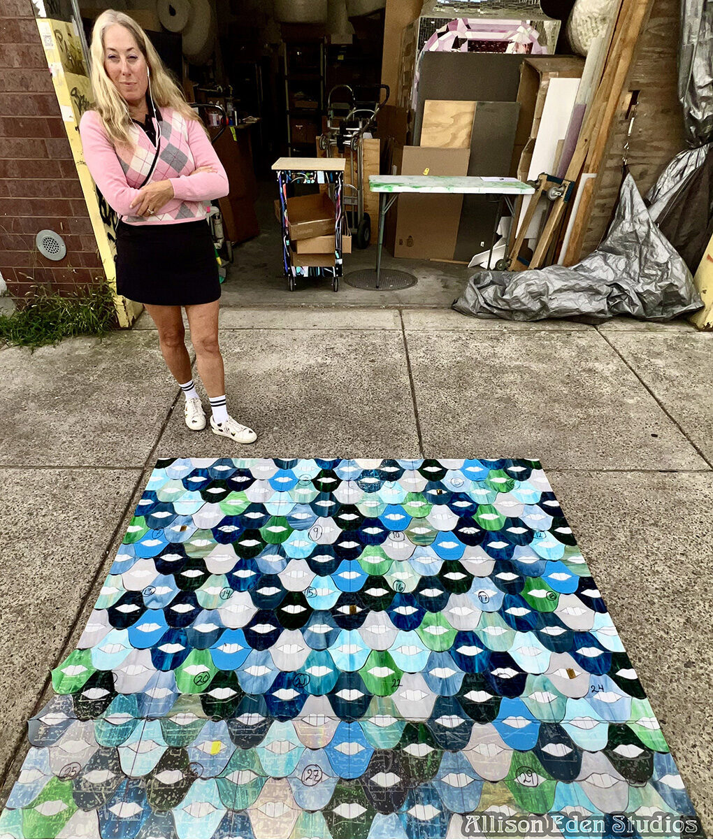 Allison Eden Studios checking SMILE Lips on the sidewalk wm
