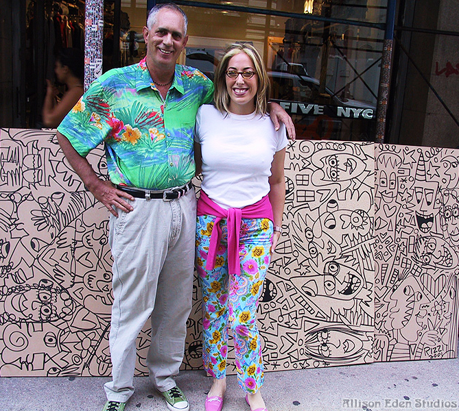 Rizzi and Allison standing in SOHO with artwork