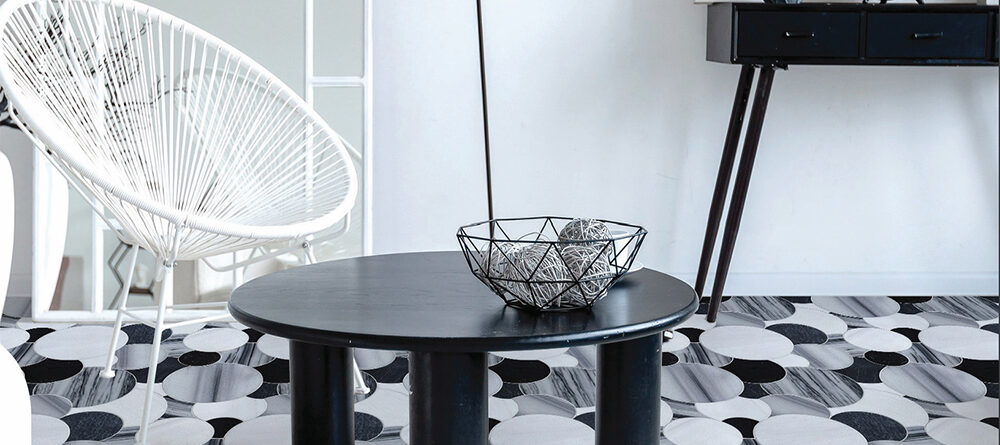 Black and white marble mosaic floor featuring Allison Eden Studios’ Overlapping Circles pattern in a modern luxury residential interior.