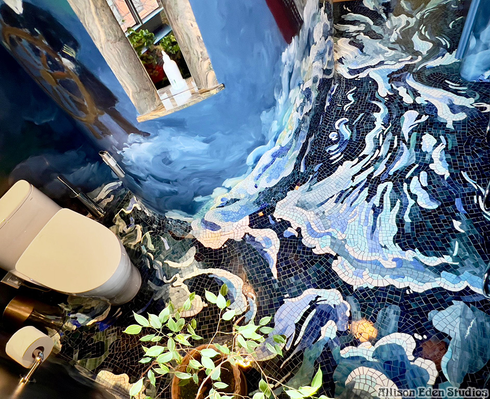 Floor-to-ceiling custom glass mosaic bathroom by Allison Eden Studios featuring dramatic ocean waves, a Titanic-inspired shower, handcrafted stained glass walls, and an immersive luxury spa design.