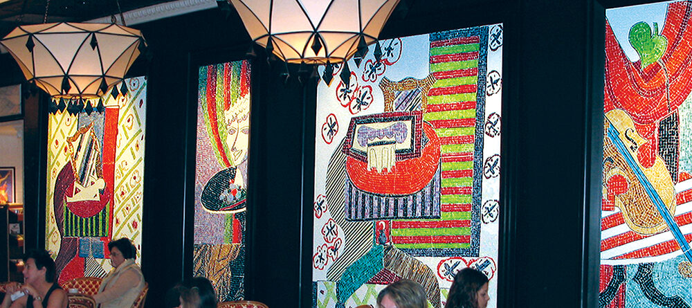 Colorful custom glass mosaic murals by Allison Eden Studios inside a café at Wynn Las Vegas