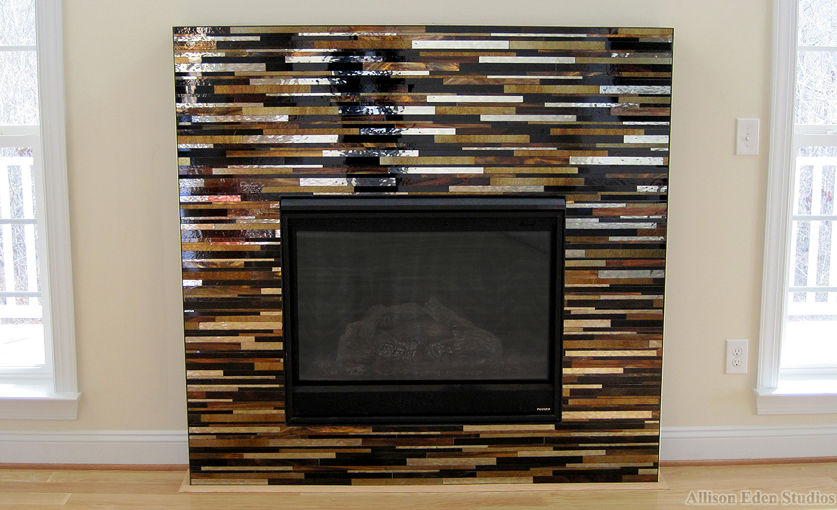 chocolate gold linear glass mosaic fireplace