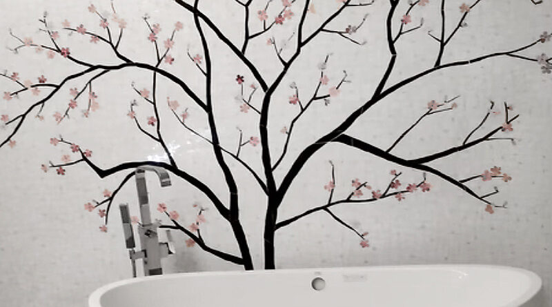 Custom cherry blossom stained glass mosaic mural behind a freestanding white bathtub by Allison Eden Studios