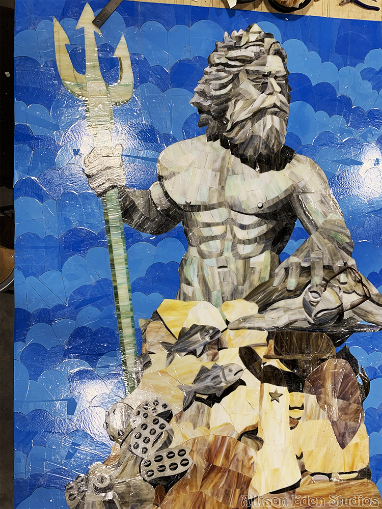 Detailed Neptune portrait handcrafted in stained glass mosaic by Allison Eden Studios.