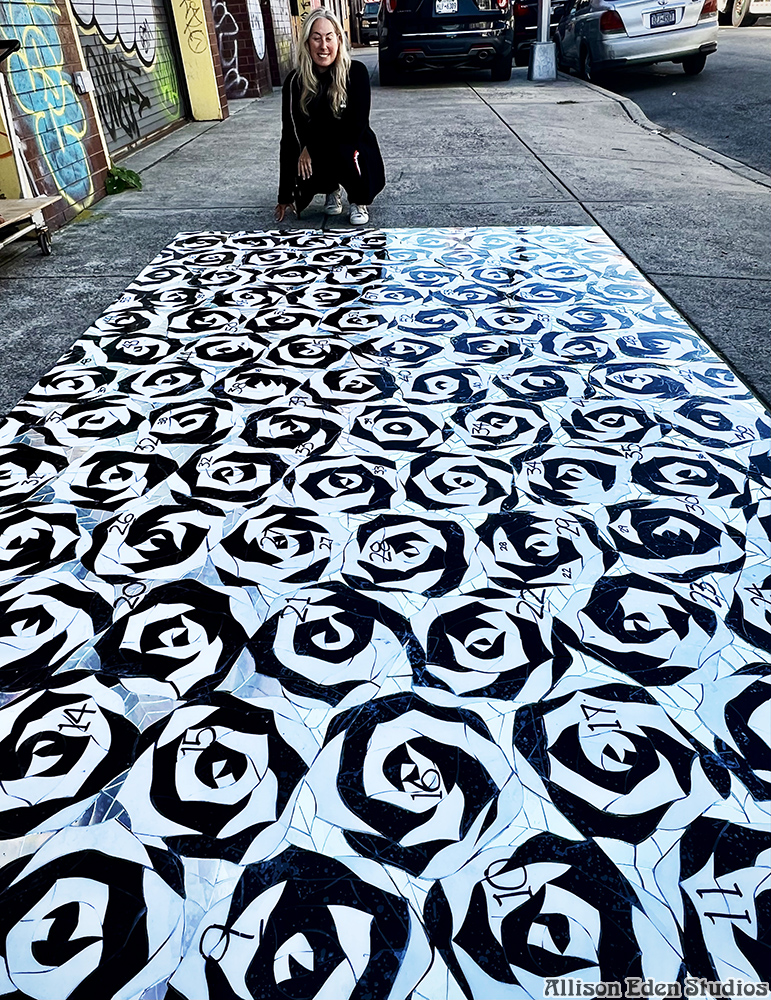 Allison Eden Studios Allison inspects glass and mirror mosaic tile interlocking roses