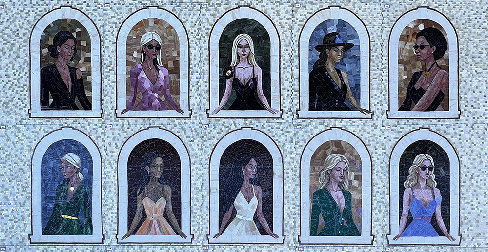 Allison Eden’s Girls in Windows — a large-scale stained glass mosaic featuring 15 individually handcrafted women, created over weeks at Allison Eden Studios in Brooklyn.